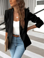 Women's single button blazer with narrow lapels and ruched sleeves