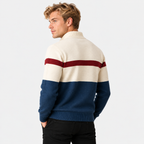 Men's half-zip color block knit sweater in cream and navy, back view on a model