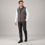 Men's sleeveless collared vest with structured finish on a model, angled front view