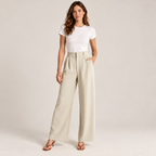 Women's casual high waisted wide-leg dress pants on a model, closer front view