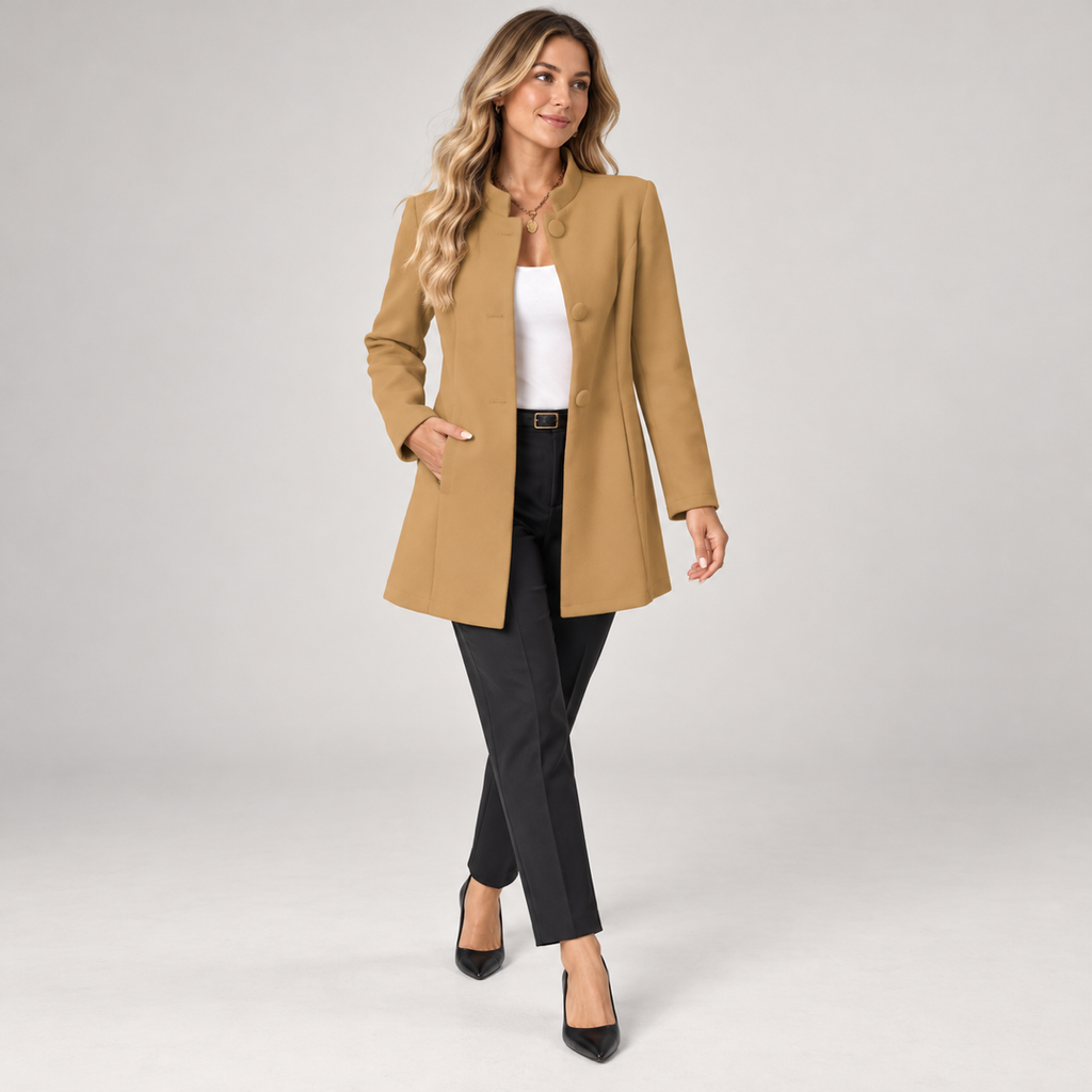 Women's collarless longline blazer with open front on a model, walking pose