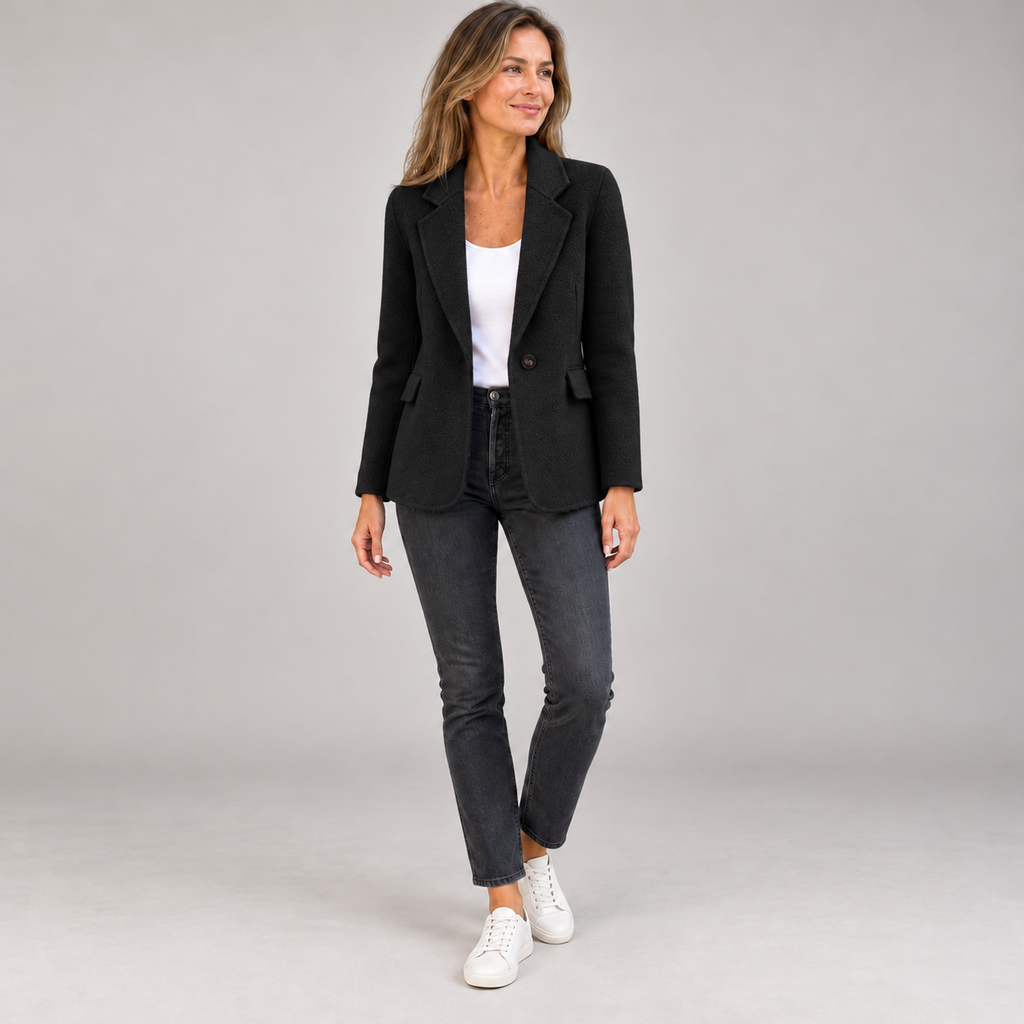 Women's lightweight breathable blazer on a model in Black, additional studio view