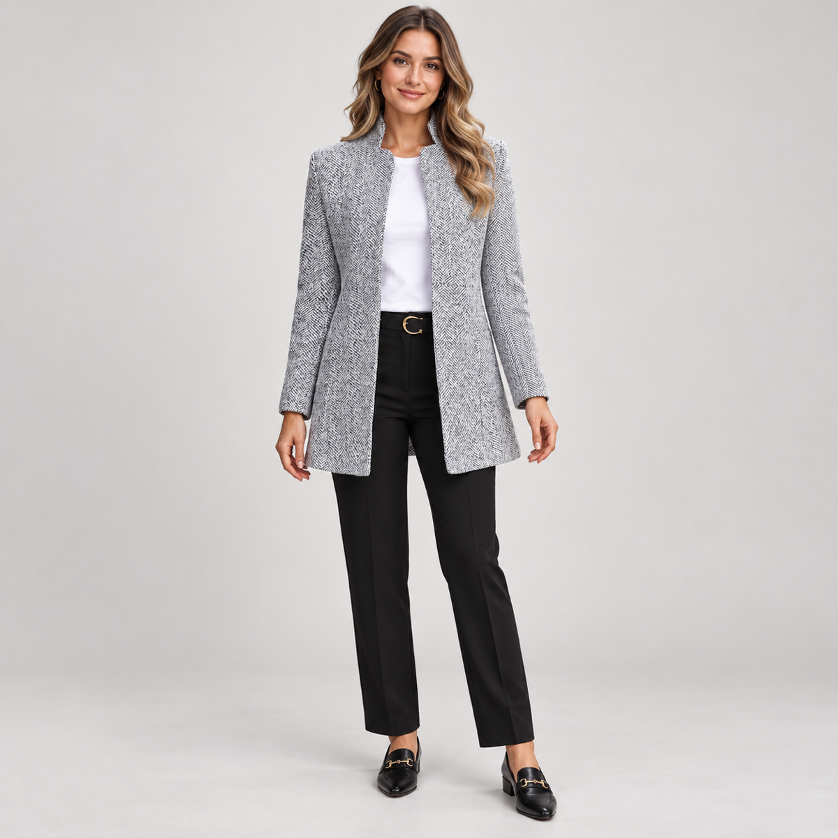 Women's longline open front blazer with stand collar on a model, front view