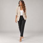 Women's single button blazer with narrow lapels and ruched sleeves on a model, walking pose