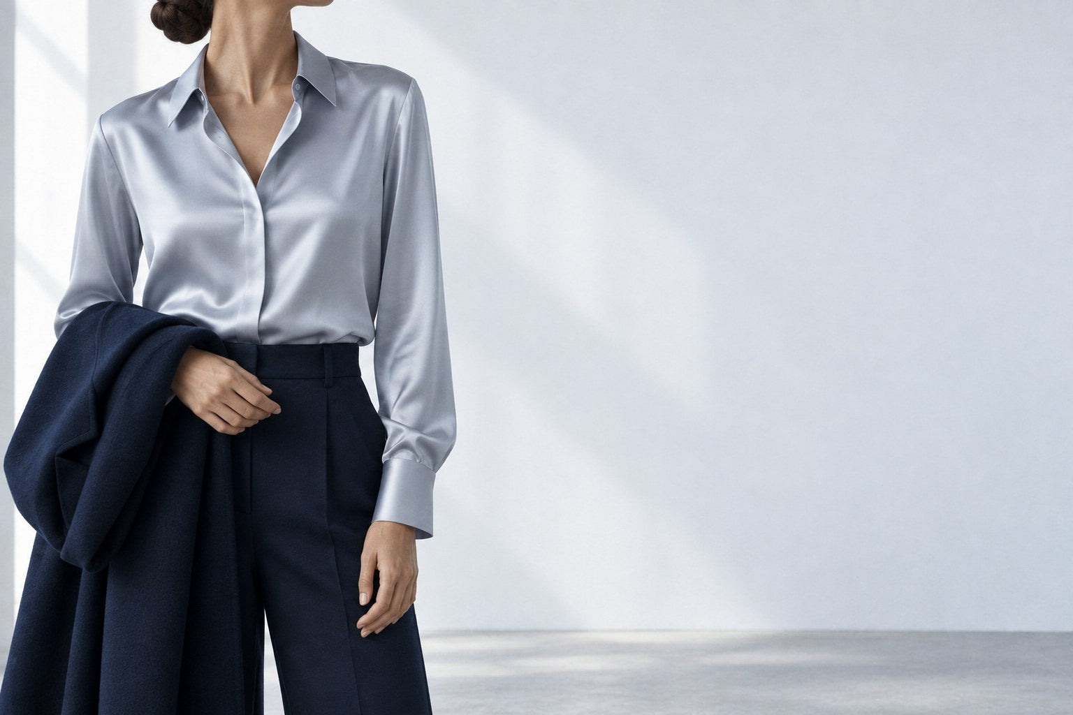 Suki Moon: silver satin blouse and folded navy coat