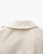 Women's Belted Trench Coat with Storm Flaps and Cuffed Sleeves
